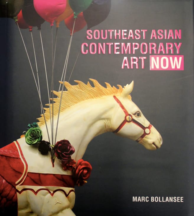 Carousel horse decorated with roses and balloons against a dark background, with bold pink title.